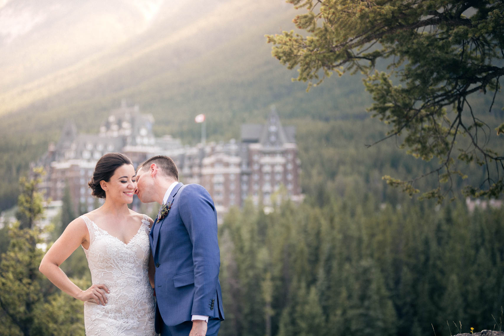 Bride and groom in front of the Banff Springs Hotel wedding venue
