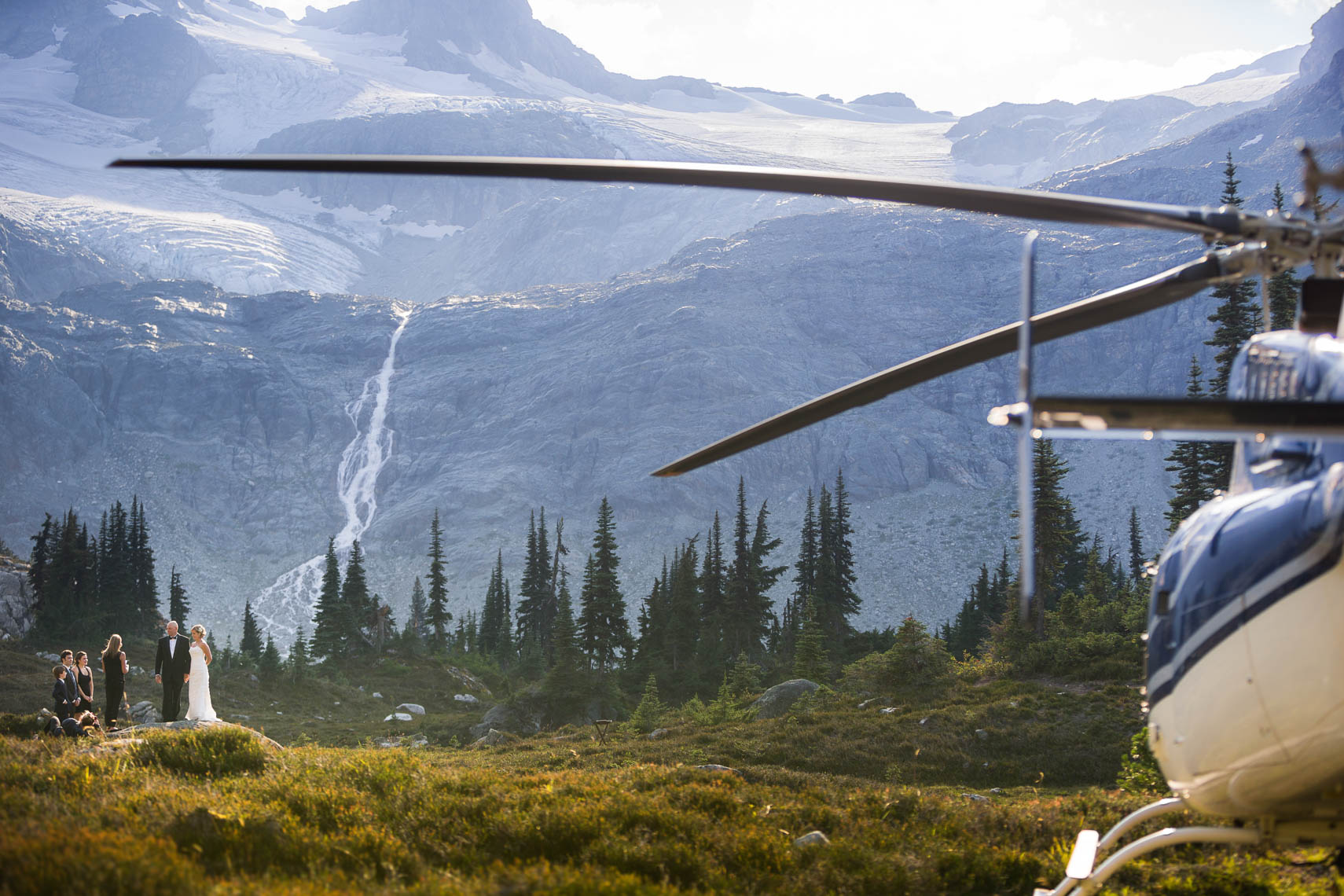 Wedding ceremony in the mountains with helicopter near Whistler Canada